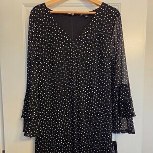 INC Black with white polka dots. Sheer bell sleeve zippered back. Size XL. NWT